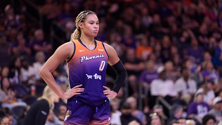 Sep 14, 2025; Phoenix, Arizona, USA; Phoenix Mercury forward Satou Sabally (0) reacts during overtime against the New York Liberty during game one of the 2025 WNBA Playoffs round one at PHX Arena. Mandatory Credit: Allan Henry-Imagn Images