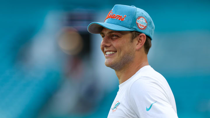 Miami Dolphins quarterback Zach Wilson (0) looks on before a game against the New England Patriots at Hard Rock Stadium. Miami Dolphins quarterback Zach Wilson (0) looks on before a game against the New England Patriots at Hard Rock Stadium.