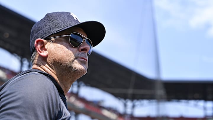 Aug 17, 2025; St. Louis, Missouri, USA;  New York Yankees manager Aaron Boone (17) looks on from the dugout during the third inning against the St. Louis Cardinals at Busch Stadium. Mandatory Credit: Jeff Curry-Imagn Images