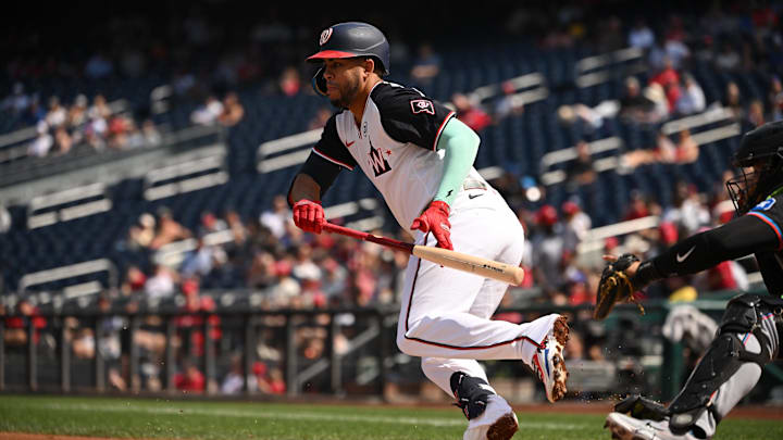 Sep 15, 2024; Washington, District of Columbia, USA; Washington Nationals second baseman Luis Garcia Jr. (2) runs to first base after laying down a bunt against the Miami Marlins during the first inning at Nationals Park. 