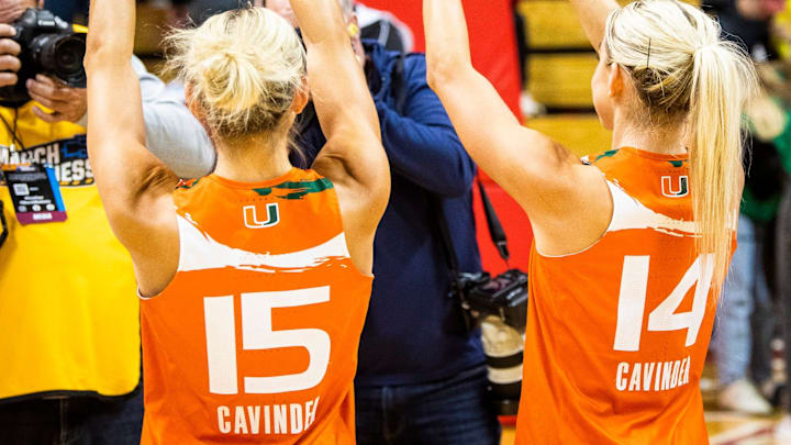 Miami (FL)'s Hanna Cavinder (15) and Haley Cavinder (14) makes the \"U\" sign after the second half of the NCAA Tournament Second Round game between Indiana and Miami (FL) at Simon Skjodt Assembly Hall on Monday, March 20, 2023.

Iu Um Wbb 2h Cavinder Twins Celebrate