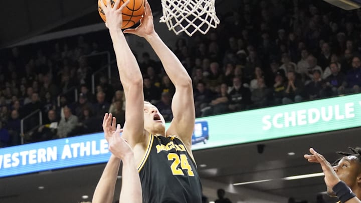 Feb 22, 2024; Evanston, Illinois, USA; Michigan Wolverines forward Youssef Khayat (24) grabs a