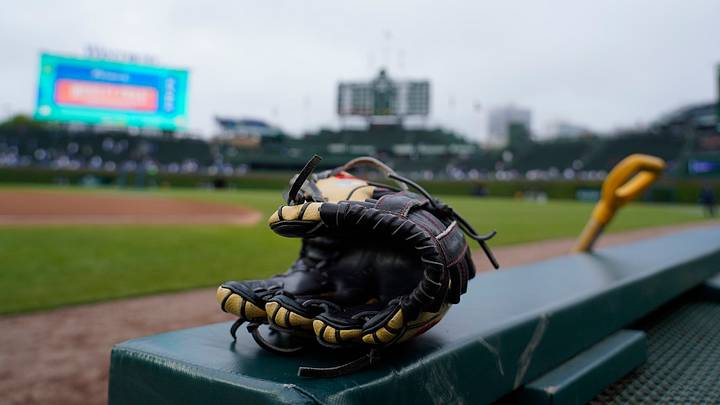 An up-close shot of a Colorado Rockies player's baseball glove An up-close shot of a Colorado Rockies player's baseball glove