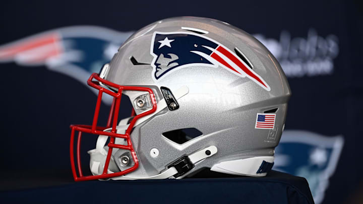 Jan 17, 2024; Foxborough, MA, USA; A New England Patriots helmet sits on a table prior to a press conference at Gillette Stadium. Mandatory Credit: Eric Canha-Imagn Images