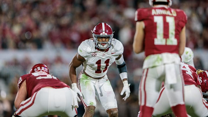 Nov 23, 2024; Norman, Oklahoma, USA;  Alabama Crimson Tide linebacker Jihaad Campbell (11) ready for the play during the third quarter against the Oklahoma Sooners at Gaylord Family-Oklahoma Memorial Stadium. Mandatory Credit: William Purnell-Imagn Images