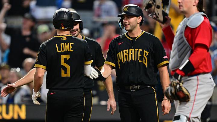 Aug 14, 2026; Pittsburgh, Pennsylvania, USA; Pittsburgh Pirates second baseman Brandon Lowe (5) is congratulated at home plate after hitting a three-run home run during the fifth inning against the Boston Red Sox at PNC Park. Mandatory Credit: David Dermer-Imagn Images