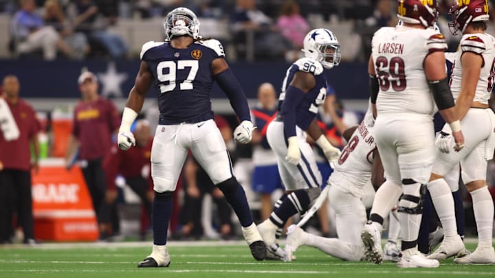 Dallas Cowboys defensive tackle Osa Odighizuwa celebrates a sack in the second half against the Washington Commanders. Dallas Cowboys defensive tackle Osa Odighizuwa celebrates a sack in the second half against the Washington Commanders.