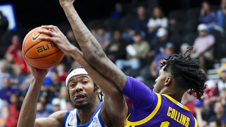 Dec 14, 2024; Frisco, Texas, USA;  Southern Methodist Mustangs forward Yohan Traore (21) looks to shoot as LSU Tigers forward Daimion Collins (10) defends during the first half at Comerica Center. Mandatory Credit: Kevin Jairaj-Imagn Images