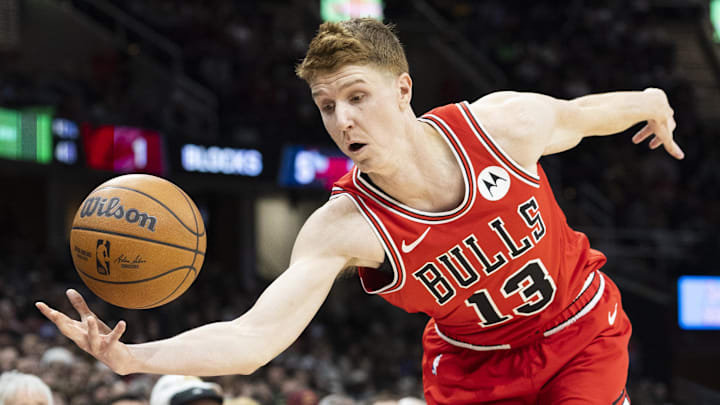 Dec 19, 2025; Cleveland, Ohio, USA; Chicago Bulls guard-forward Kevin Huerter (13) reaches to keep the ball inbounds against the Cleveland Cavaliers during the fourth quarter at Rocket Arena. Mandatory Credit: Scott Galvin-Imagn Images