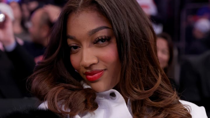 Dec 3, 2024; New York, New York, USA; Chicago Sky forward Angel Reese sits court side during the fourth quarter between the New York Knicks and the Orlando Magic at Madison Square Garden. 