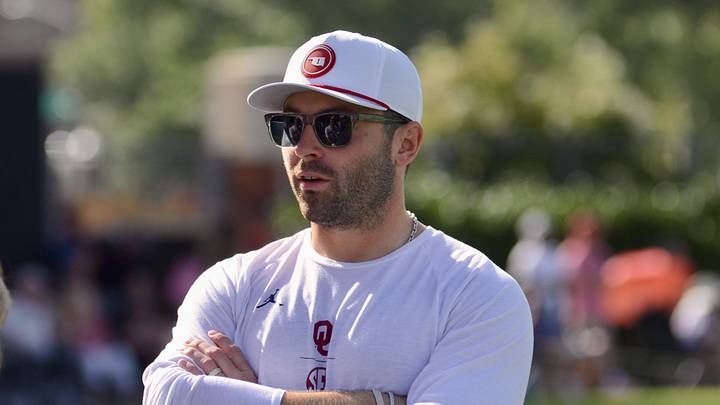 Former Oklahoma quarterback Baker Mayfield oversees a drill at his youth football camp.