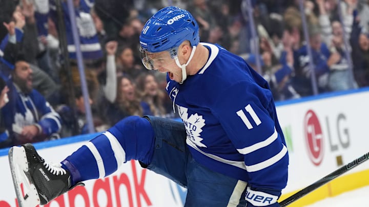 Dec 15, 2024; Toronto, Ontario, CAN; Toronto Maple Leafs center Max Domi (11) scores a goal and celebrates against the against the Buffalo Sabres during the first period at Scotiabank Arena. Mandatory Credit: Nick Turchiaro-Imagn Images