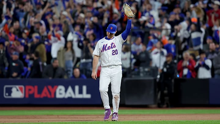 Oct 18, 2024; New York City, New York, USA; New York Mets first baseman Pete Alonso (20) reacts after defeating the Los Angeles Dodgers in game five of the NLCS during the 2024 MLB playoffs at Citi Field. 