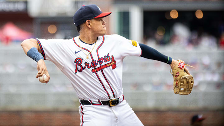 Former Atlanta Braves third baseman Gio Urshela (9) throws the ball to first base in the game against the Kansas City Royals during the first inning at Truist Park.