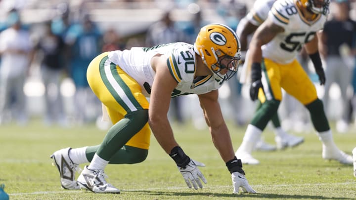 Oct 27, 2024; Jacksonville, Florida, USA; Green Bay Packers defensive lineman Lukas Van Ness (90) waits for the snap against the Jacksonville Jaguars during the second quarter at EverBank Stadium. 