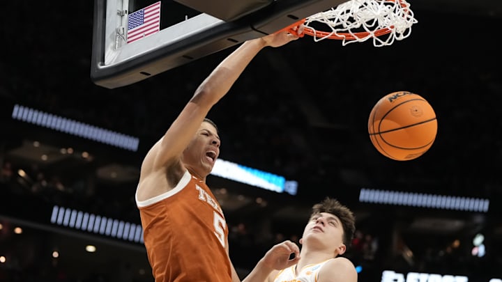 March 23, 2024, Charlotte, NC, USA; Texas Longhorns forward Kadin Shedrick (5) dunks.