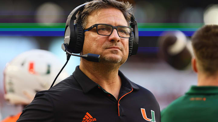 Sep 7, 2024; Miami Gardens, Florida, USA; Miami Hurricanes offensive coordinator Shannon Dawson looks on from the sideline against the Florida A&M Rattlers during the first quarter at Hard Rock Stadium. Mandatory Credit: Sam Navarro-Imagn Images