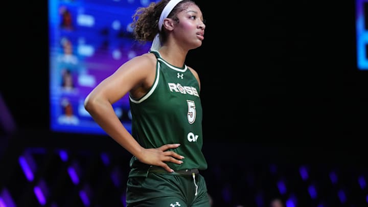 Jan 17, 2025; Miami, FL, USA; Angel Reese (5) of the Rose takes a moment against the Vinyl during a timeout in the first half of the Unrivaled women’s professional 3v3 basketball league at Wayfair Arena. Mandatory Credit: Jim Rassol-Imagn Images