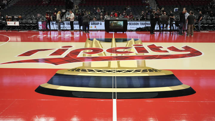 Nov 3, 2023; Portland, Oregon, USA; The Portland Trail Blazers logo at center court before the game against the Memphis Grizzlies at Moda Center. Mandatory Credit: Soobum Im-USA TODAY Sports Nov 3, 2023; Portland, Oregon, USA; The Portland Trail Blazers logo at center court before the game against the Memphis Grizzlies at Moda Center. Mandatory Credit: Soobum Im-USA TODAY Sports