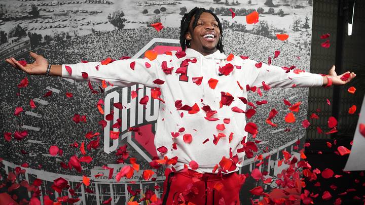 Ohio State Buckeyes cornerback Davison Igbinosun (1) poses during Rose Bowl media day at Sheraton Grand LA. Ohio State Buckeyes cornerback Davison Igbinosun (1) poses during Rose Bowl media day at Sheraton Grand LA.