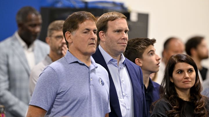 Jun 27, 2025; Dallas, TX, USA; Dallas Mavericks minority owner Mark Cuban (left) and Mavericks governor Patrick Dumont (right) looks on a press conference at the Dallas Mavericks Practice Facility. Mandatory Credit: Jerome Miron-Imagn Images