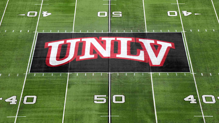 Dec 2, 2023; Las Vegas, NV, USA; The UNLV Rebels logo at midfield during the Mountain West Championship at Allegiant Stadium. Mandatory Credit: Kirby Lee-Imagn Images Dec 2, 2023; Las Vegas, NV, USA; The UNLV Rebels logo at midfield during the Mountain West Championship at Allegiant Stadium. Mandatory Credit: Kirby Lee-Imagn Images