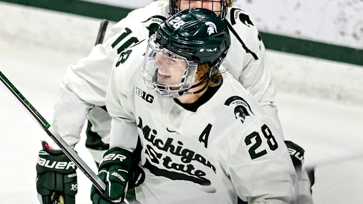 Michigan State's Karsen Dorwart smiles after scoring against Minnesota during the third period on Friday, Jan. 26, 2024, at Munn Arena in East Lansing. Michigan State's Karsen Dorwart smiles after scoring against Minnesota during the third period on Friday, Jan. 26, 2024, at Munn Arena in East Lansing.