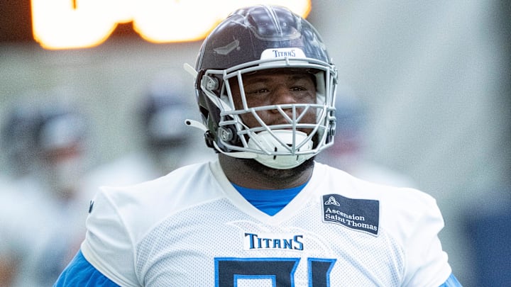 Defensive lineman Keondre Coburn (91) runs through drills during the Tennessee Titans mandatory mini-camp at Ascension Saint Thomas Sports Park in Nashville, Tenn., Tuesday, June 4, 2024.