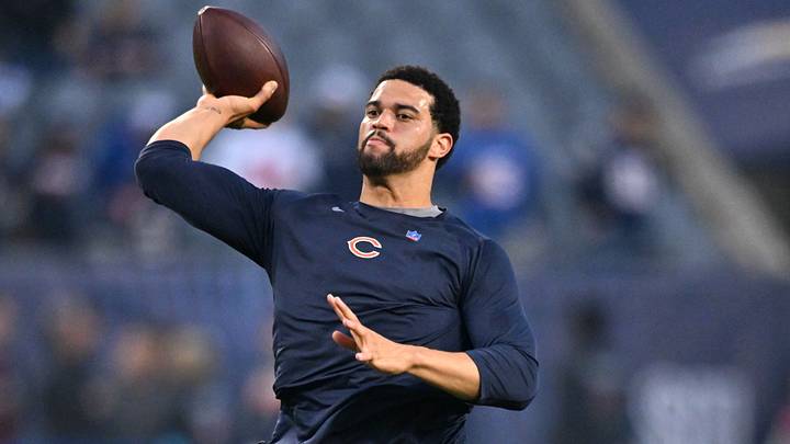 Chicago Bears quarterback Caleb Williams (18) warms up prior to the game against the New England Patriots at Soldier Field.  Mandatory Credit: Patrick Gorski-Imagn Images