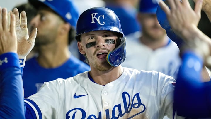 Sep 17, 2024; Kansas City, Missouri, USA; Kansas City Royals shortstop Bobby Witt Jr. (7) is congratulated by teammates after scoring a run during the third inning against the Detroit Tigers at Kauffman Stadium. Sep 17, 2024; Kansas City, Missouri, USA; Kansas City Royals shortstop Bobby Witt Jr. (7) is congratulated by teammates after scoring a run during the third inning against the Detroit Tigers at Kauffman Stadium.