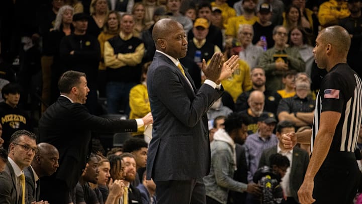 Feb. 9, 2025; Columbia, Missouri, USA; Missouri Tigers head coach Dennis Gates applauds his team against the Texas A&M Aggies at Mizzou Arena.