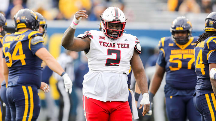 Nov 29, 2025; Morgantown, West Virginia, USA; Texas Tech Red Raiders defensive tackle Lee Hunter (2) signals to the sideline during the second quarter against the West Virginia Mountaineers at Milan Puskar Stadium. Mandatory Credit: Ben Queen-Imagn Images