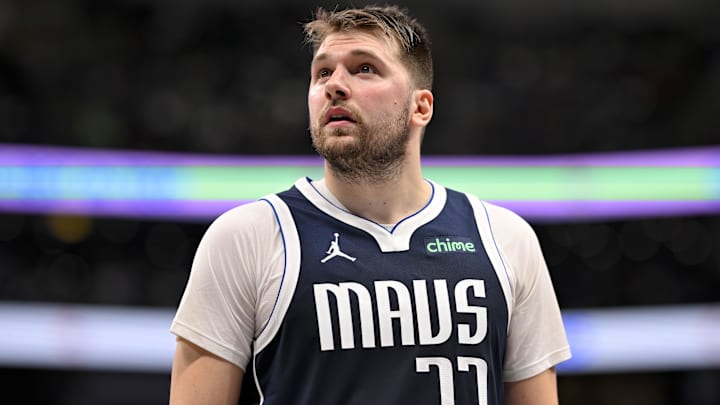 Dec 23, 2024; Dallas, Texas, USA; Dallas Mavericks guard Luka Doncic (77) checks the scoreboard during the second half against the Portland Trail Blazers at the American Airlines Center. Mandatory Credit: Jerome Miron-Imagn Images