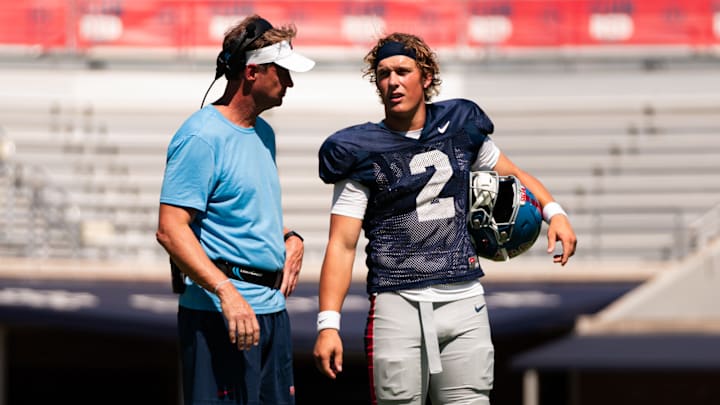 Ole Miss Rebels head coach Lane Kiffin (left) and quarterback Jaxson Dart at the team's first scrimmage of fall camp.