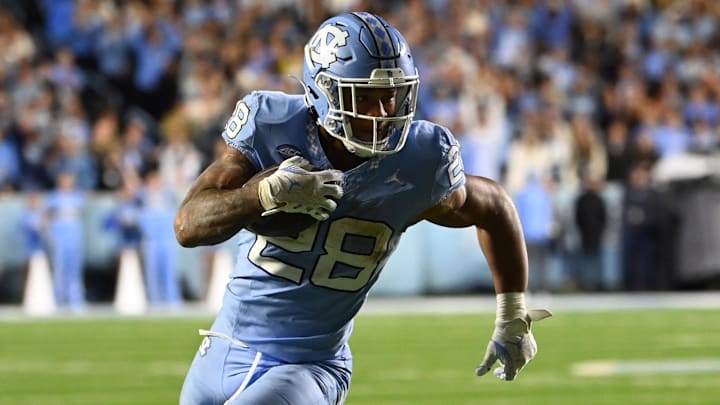 Nov 11, 2023; Chapel Hill, North Carolina, USA; North Carolina Tar Heels running back Omarion Hampton (28) in the first overtime at Kenan Memorial Stadium.