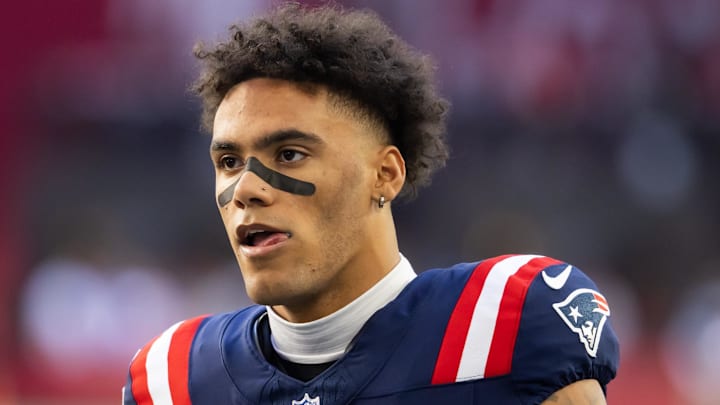 Dec 15, 2024; Glendale, Arizona, USA; New England Patriots cornerback Christian Gonzalez (0) against the Arizona Cardinals at State Farm Stadium. Mandatory Credit: Mark J. Rebilas-Imagn Images Dec 15, 2024; Glendale, Arizona, USA; New England Patriots cornerback Christian Gonzalez (0) against the Arizona Cardinals at State Farm Stadium. Mandatory Credit: Mark J. Rebilas-Imagn Images