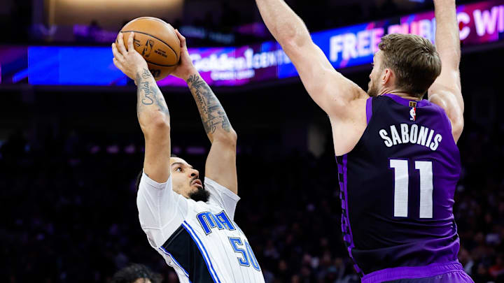 Orlando Magic guard Cole Anthony (50) shoots the ball against Sacramento Kings forward Domantas Sabonis (11) during the second quarter at Golden 1 Center.