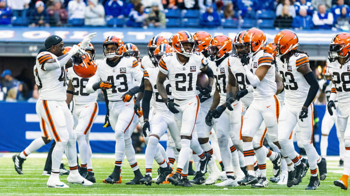 Oct 22, 2023; Indianapolis, Indiana, USA; Cleveland Browns cornerback Denzel Ward (21) celebrates his interception with teammates in the second half against the Indianapolis Colts at Lucas Oil Stadium. Mandatory Credit: Trevor Ruszkowski-USA TODAY Sports