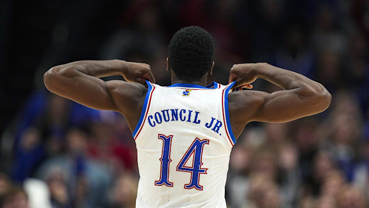 Dec 7, 2025; Kansas City, Missouri, USA; Kansas Jayhawks guard Melvin Council Jr. (14) celebrates after defeating the Missouri Tigers at T-Mobile Center. Mandatory Credit: Jay Biggerstaff-Imagn Images