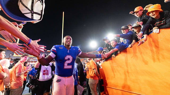 Oct 19, 2024; Gainesville, Florida, USA; Florida Gators quarterback DJ Lagway (2) shakes hands while entering the locker room after a game against the Kentucky Wildcats at Ben Hill Griffin Stadium. Mandatory Credit: Matt Pendleton-Imagn Images Oct 19, 2024; Gainesville, Florida, USA; Florida Gators quarterback DJ Lagway (2) shakes hands while entering the locker room after a game against the Kentucky Wildcats at Ben Hill Griffin Stadium. Mandatory Credit: Matt Pendleton-Imagn Images