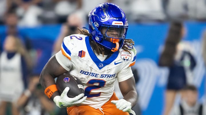 Dec 31, 2024; Glendale, AZ, USA; Boise State Broncos running back Ashton Jeanty (2) against the Penn State Nittany Lions during the Fiesta Bowl at State Farm Stadium. Mandatory Credit: Mark J. Rebilas-Imagn Images