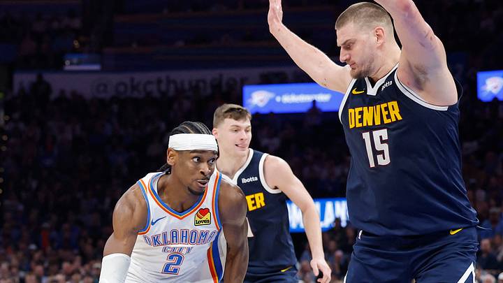 Mar 10, 2025; Oklahoma City, Oklahoma, USA; Oklahoma City Thunder guard Shai Gilgeous-Alexander (2) drives against Denver Nuggets center Nikola Jokic (15) during the second half at Paycom Center. Mandatory Credit: Alonzo Adams-Imagn Images
