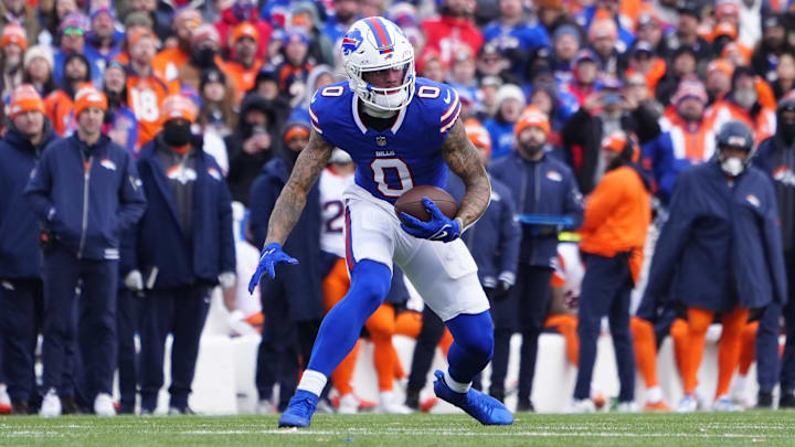 Jan 12, 2025; Orchard Park, New York, USA; Buffalo Bills wide receiver Keon Coleman (0) runs for a gain during the first quarter against the Denver Broncos in an AFC wild card game at Highmark Stadium. Mandatory Credit: Gregory Fisher-Imagn Images