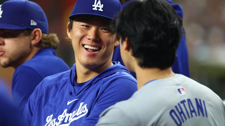 Los Angeles Dodgers pitcher Yoshinobu Yamamoto (left) with designated hitter Shohei Ohtani (17) against the Arizona Diamondbacks at Chase Field. Los Angeles Dodgers pitcher Yoshinobu Yamamoto (left) with designated hitter Shohei Ohtani (17) against the Arizona Diamondbacks at Chase Field.