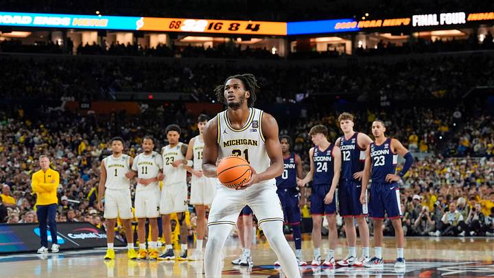 Michigan forward Morez Johnson Jr. (21) shoots a technical foul during the first half of the NCAA national championship game against Connecticut at Lucas Oil Stadium in Indianapolis on Monday, April 6, 2026. Michigan forward Morez Johnson Jr. (21) shoots a technical foul during the first half of the NCAA national championship game against Connecticut at Lucas Oil Stadium in Indianapolis on Monday, April 6, 2026.