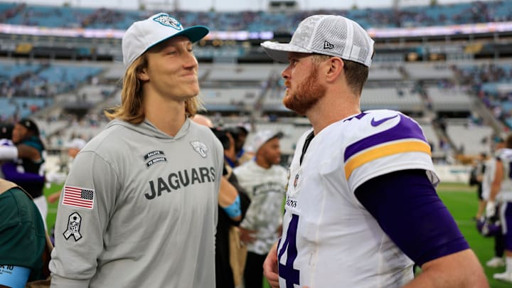 Jacksonville Jaguars quarterback Trevor Lawrence (16), left, and Minnesota Vikings quarterback Sam Darnold (14) talk after the game of an NFL football matchup Sunday, Nov. 10, 2024 at Everbank Stadium in Jacksonville, Fla. The Vikings defeated the Jaguars 12-7. [Corey Perrine/Florida Times-Union]