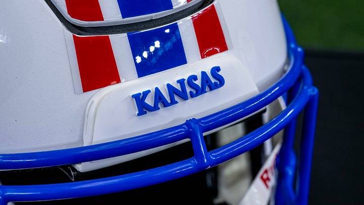 Jul 13, 2022; Arlington, TX, USA; A view of the team logo on the helmet of the Kansas Jayhawks during the Big 12 Media Day at AT&T Stadium. Mandatory Credit: Jerome Miron-USA TODAY Sports Jul 13, 2022; Arlington, TX, USA; A view of the team logo on the helmet of the Kansas Jayhawks during the Big 12 Media Day at AT&T Stadium. Mandatory Credit: Jerome Miron-USA TODAY Sports