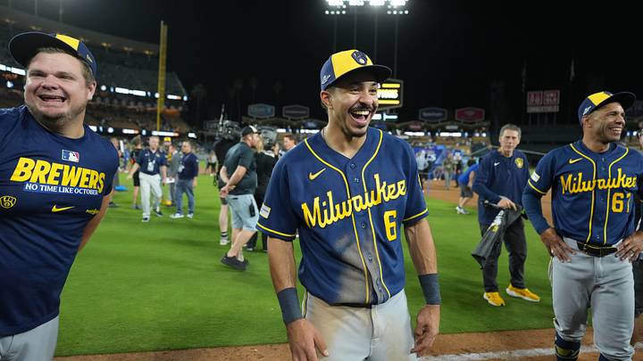 Oct 15, 2026; Los Angeles, California, USA; Milwaukee Brewers third baseman David Hamilton (6) and first base coach Spencer Allen (67) react after game four of the NLCS for the 2026 MLB Playoffs against the Los Angeles Dodgers at Uniqlo Field at Dodger Stadium. Mandatory Credit: Kirby Lee-Imagn Images