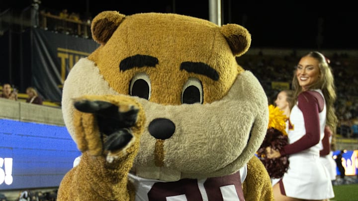 Sep 13, 2025; Berkeley, California, USA; The Minnesota Golden Gopher mascot teases a photographer during the second quarter against the California Golden Bears at California Memorial Stadium. Mandatory Credit: D. Ross Cameron-Imagn Images