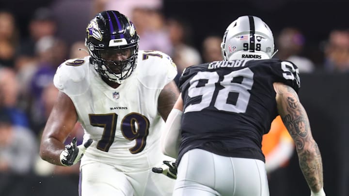 Sep 13, 2021; Paradise, Nevada, USA; Baltimore Ravens offensive tackle Ronnie Stanley (79) against Las Vegas Raiders defensive end Maxx Crosby (98) during Monday Night Football at Allegiant Stadium. Mandatory Credit: Mark J. Rebilas-Imagn Images